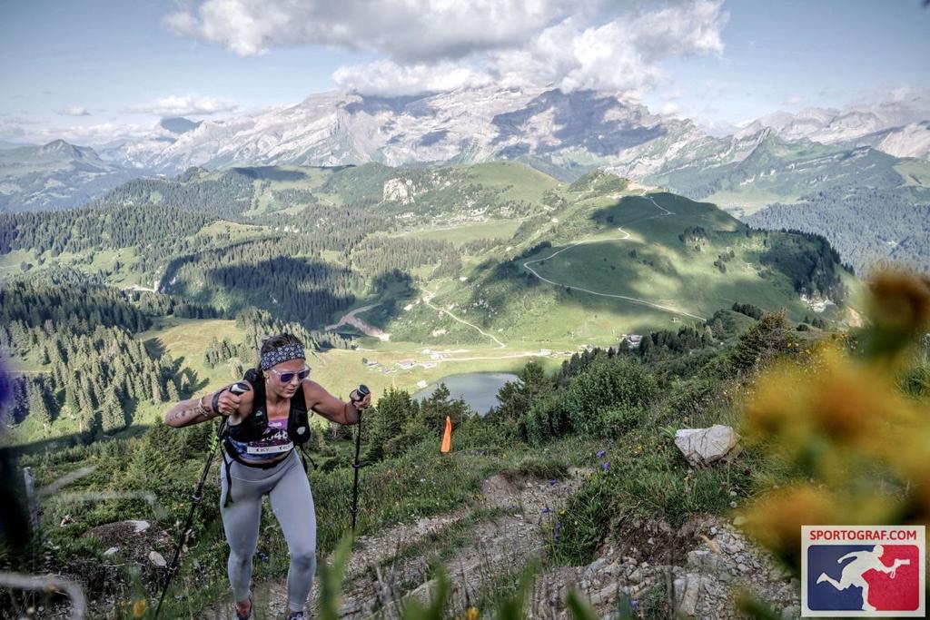 Sabine climbing a trail high in the Swiss Alps